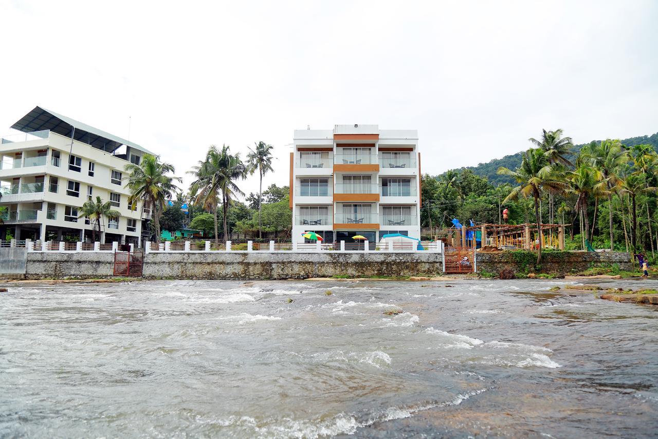 Athirapilly River Resort อทิราพาลลี ภายนอก รูปภาพ