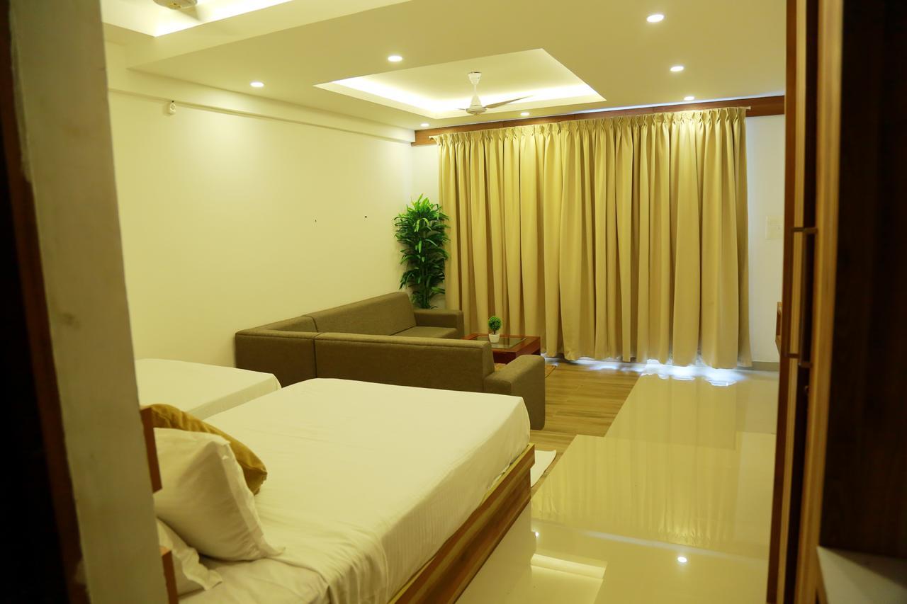 Athirapilly River Resort อทิราพาลลี ภายนอก รูปภาพ